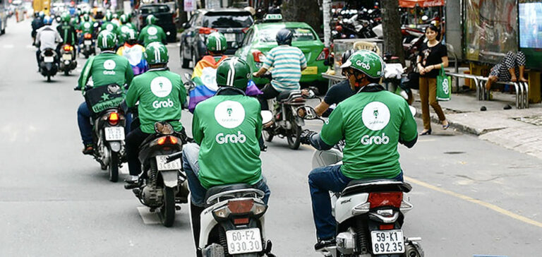 Grab riders in Ho Chi Minh City traffic