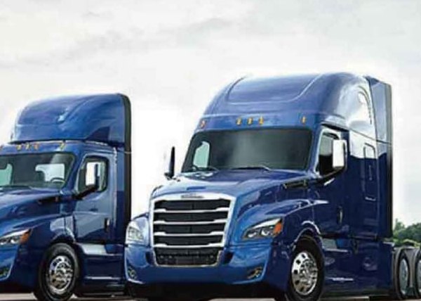 Two heavy trucks side by side